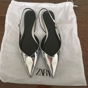 NWOT metallic silver pointed sling back flats